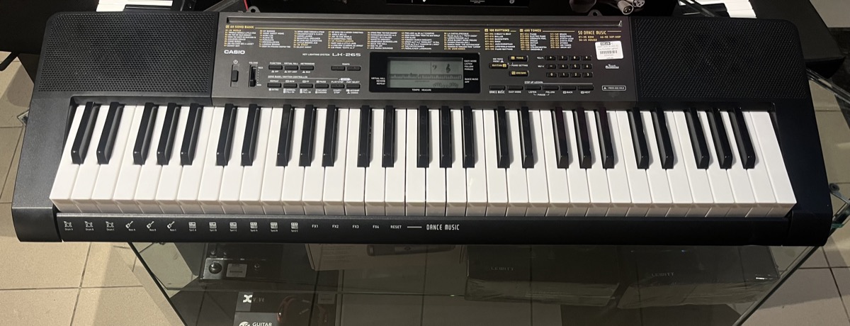 Casio USED Casio LK-265  61 Key Portable Lighted Keyboard w/ac - Used